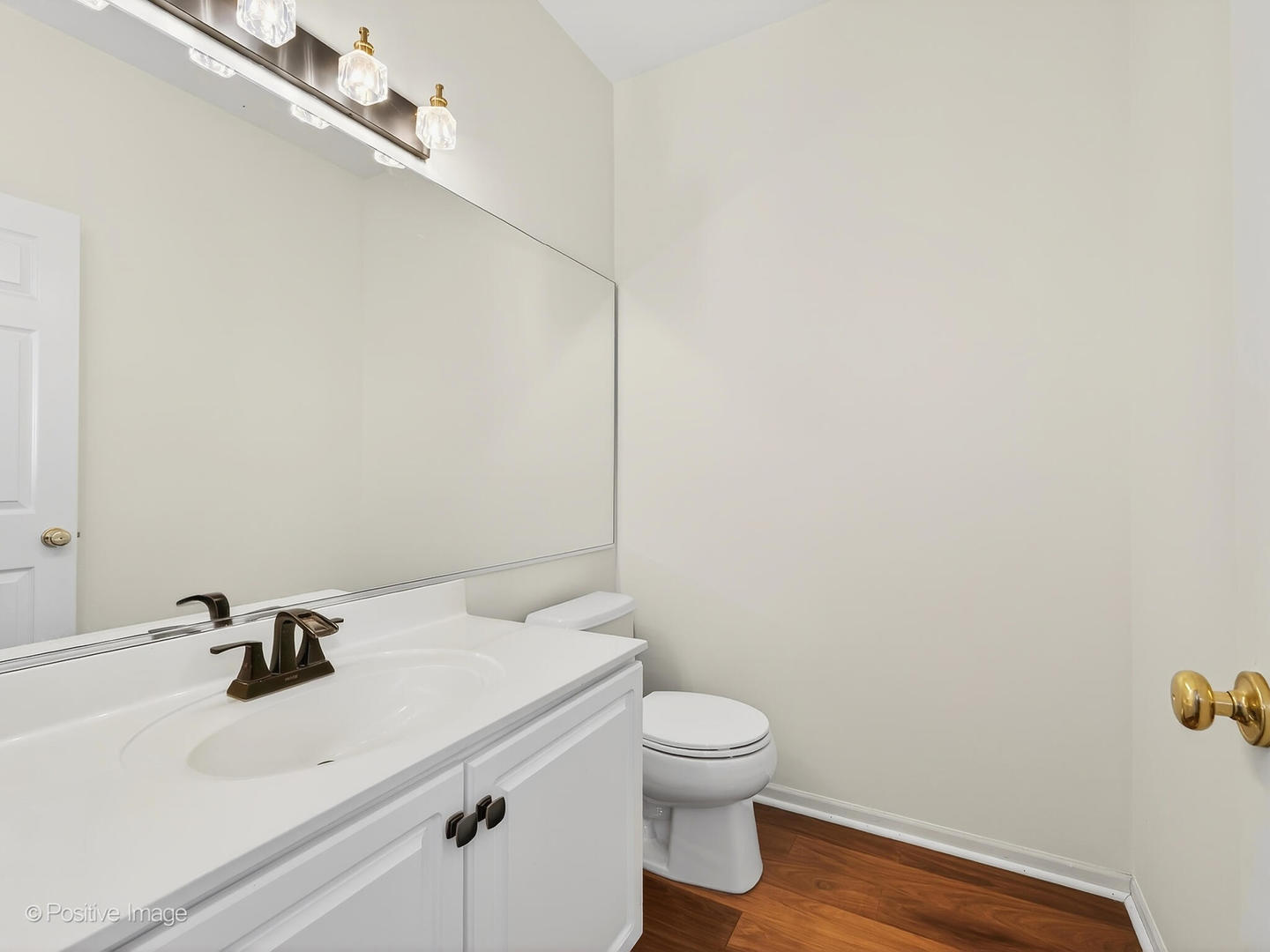 31104 Carpenter Court Warrenville, IL 60555 - Photo 17 of 32 a bathroom with a sink and a toilet
