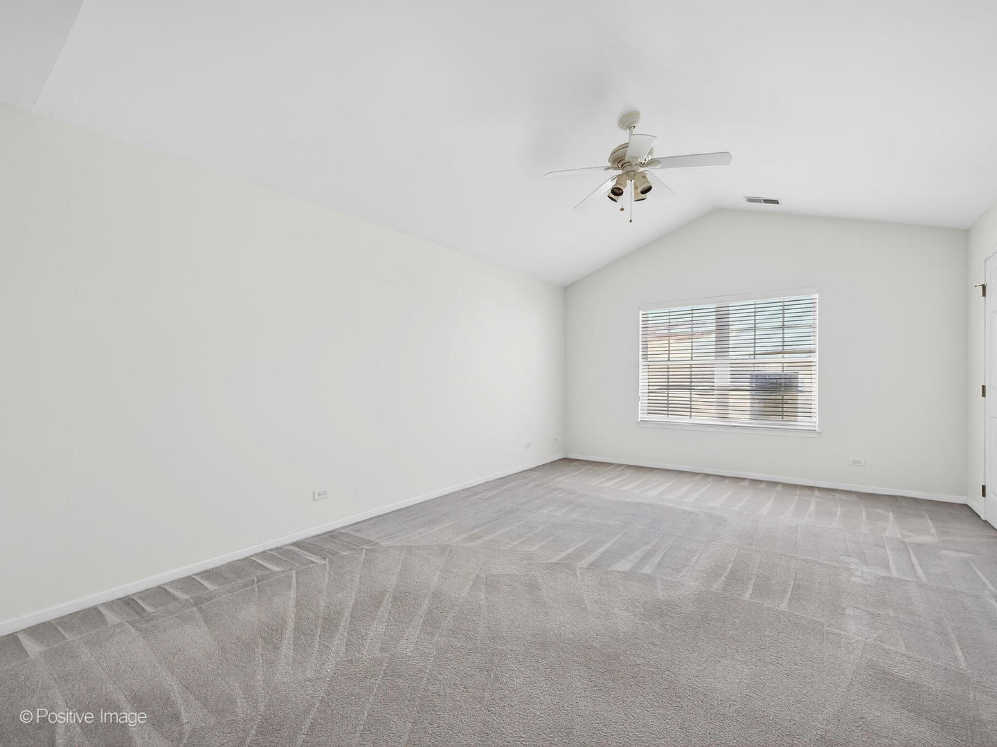 31104 Carpenter Court Warrenville, IL 60555 - Photo 18 of 32 an empty room with windows