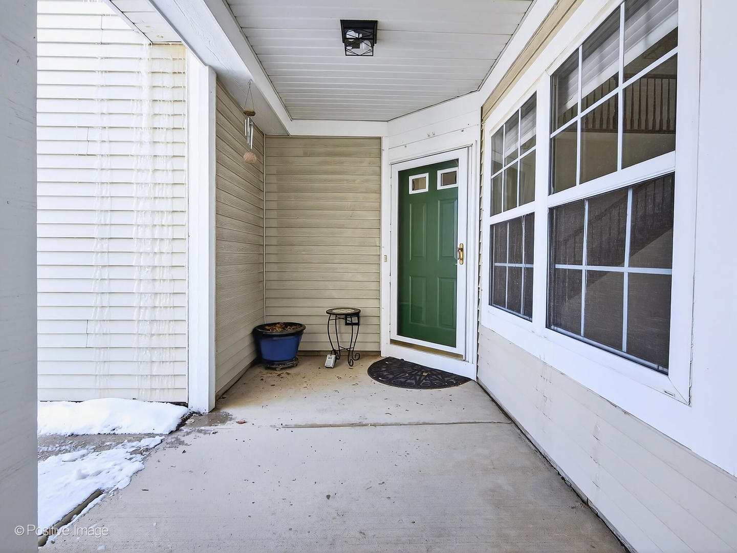 31104 Carpenter Court Warrenville, IL 60555 - Photo 2 of 32 a view of a brick house with a large window