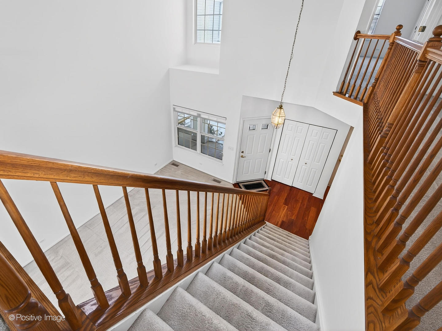 31104 Carpenter Court Warrenville, IL 60555 - Photo 4 of 32 a view of stairs and with wooden floor