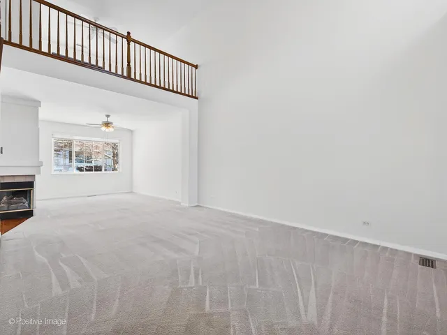 a view of a hallway with a white walls