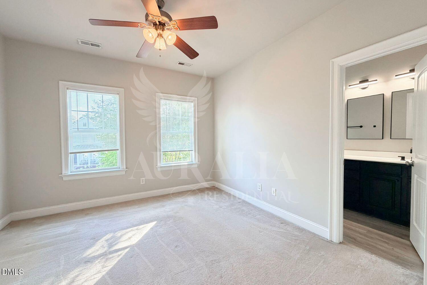 7754 ACC Boulevard Raleigh, NC 27617 - Photo 29 of 41 a view of an empty room with a window