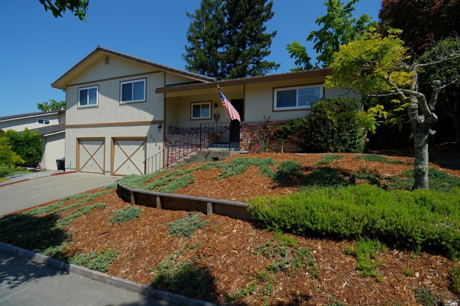 5329 Spain Avenue Santa Rosa, CA 95409 - Photo 1 of 1 The lot has a gentle downslope which allows for a prominent position affording more privacy and brighter interior.