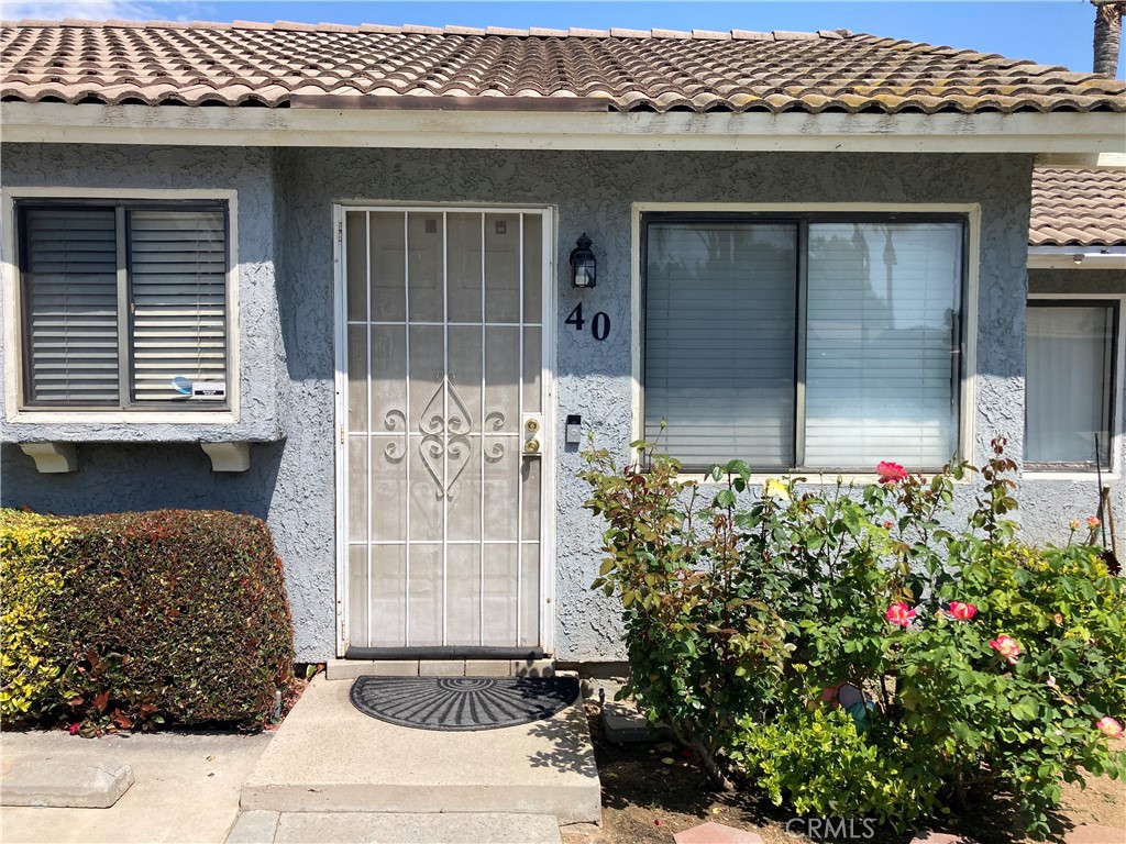9505 Arlington Avenue, Unit 40 Riverside, CA 92503 - Photo 1 of 1 a front view of a house with a shower