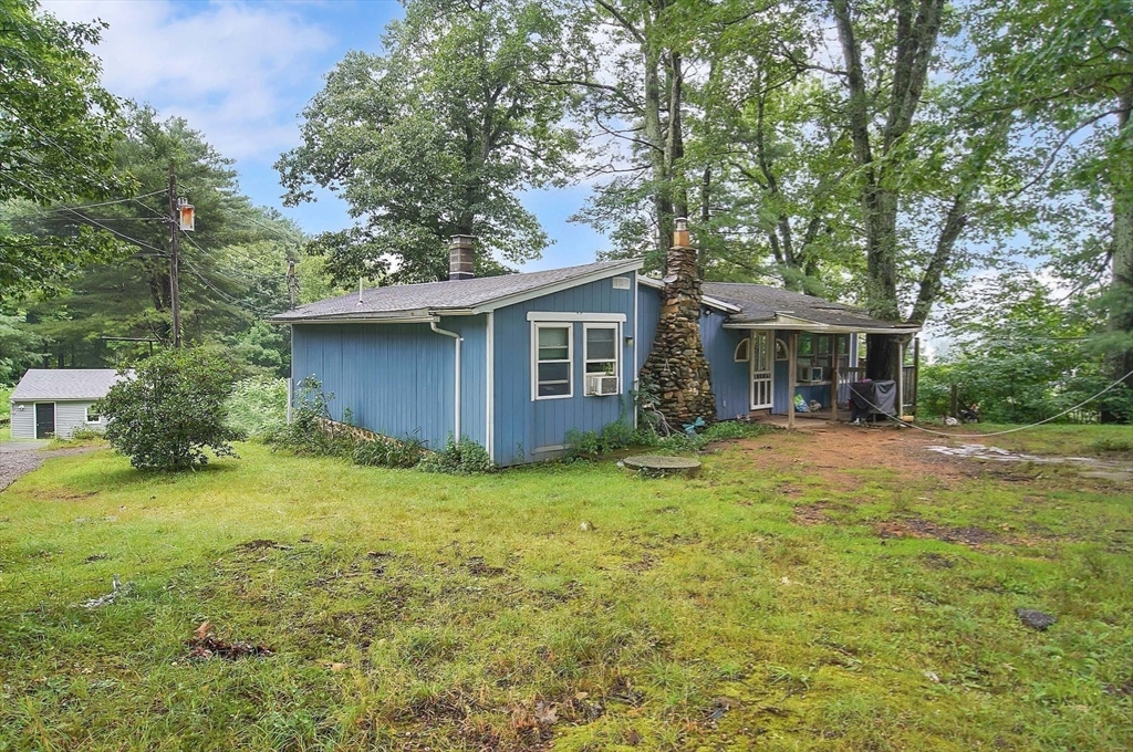 7 Davidson Road Holland, MA 01521 - Photo 29 of 32 a view of a house with backyard and garden