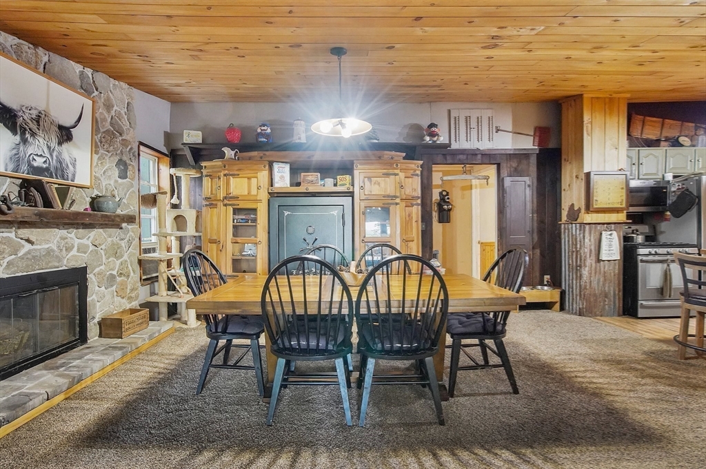 7 Davidson Road Holland, MA 01521 - Photo 4 of 32 a view of a dining room with furniture