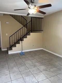 a view of entryway with stairs and wooden floor