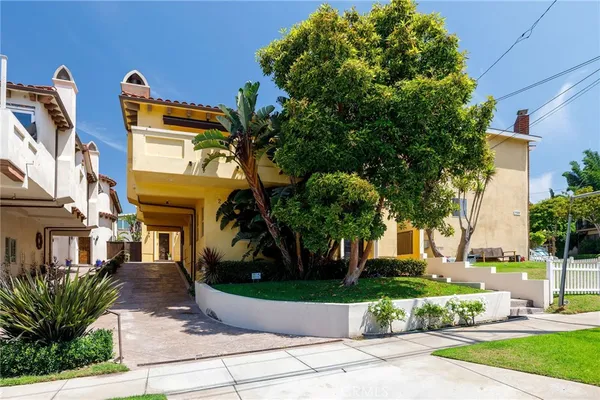 a front view of a house with entertaining space