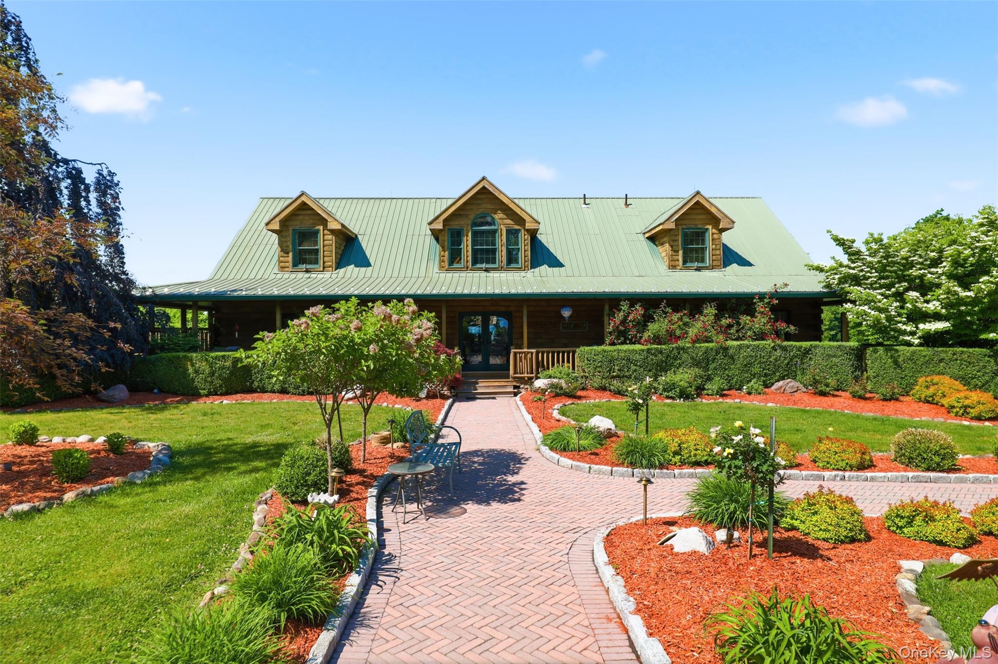 95 Judson Road Montgomery, NY 12549 - Photo 28 of 50 Beautiful gardens and paver pathways to the pool area
