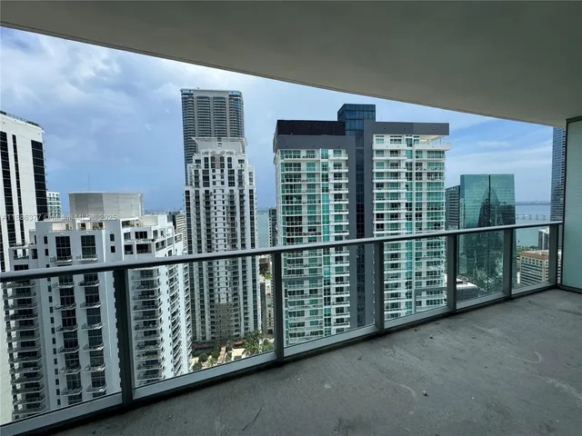 a room with a table and chairs