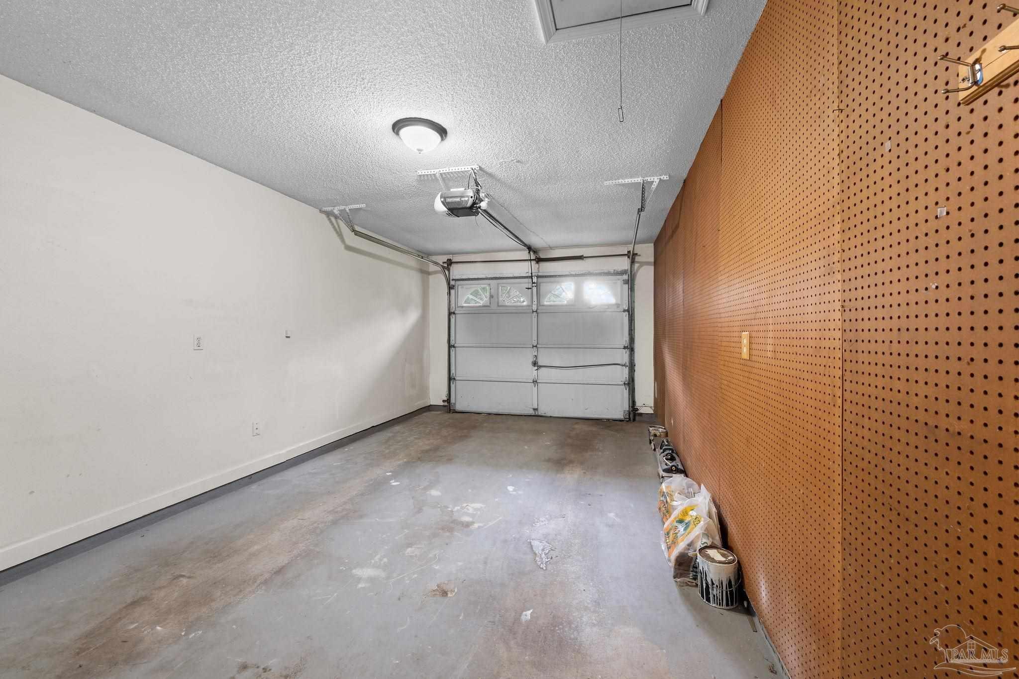 1203 Brook Bend Road Pensacola, FL 32506 - Photo 14 of 17 a view of a garage
