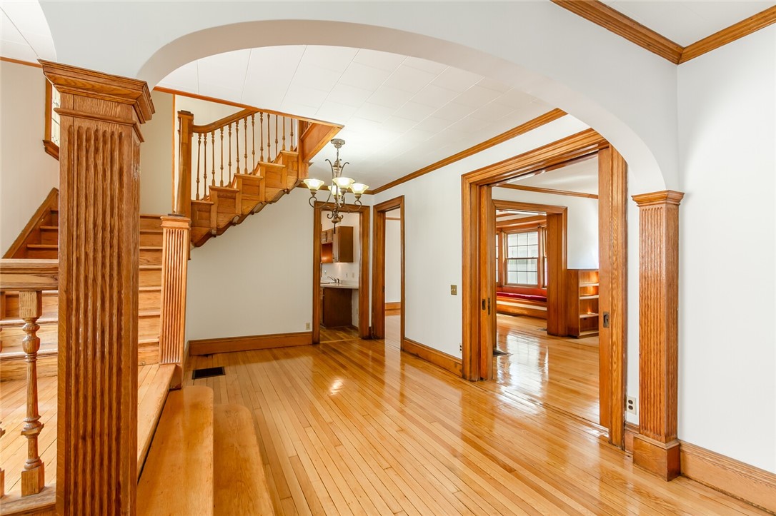9 Menlo Place Rochester, NY 14620 - Photo 11 of 42 Arched opening and beautiful hardwood floors; pock