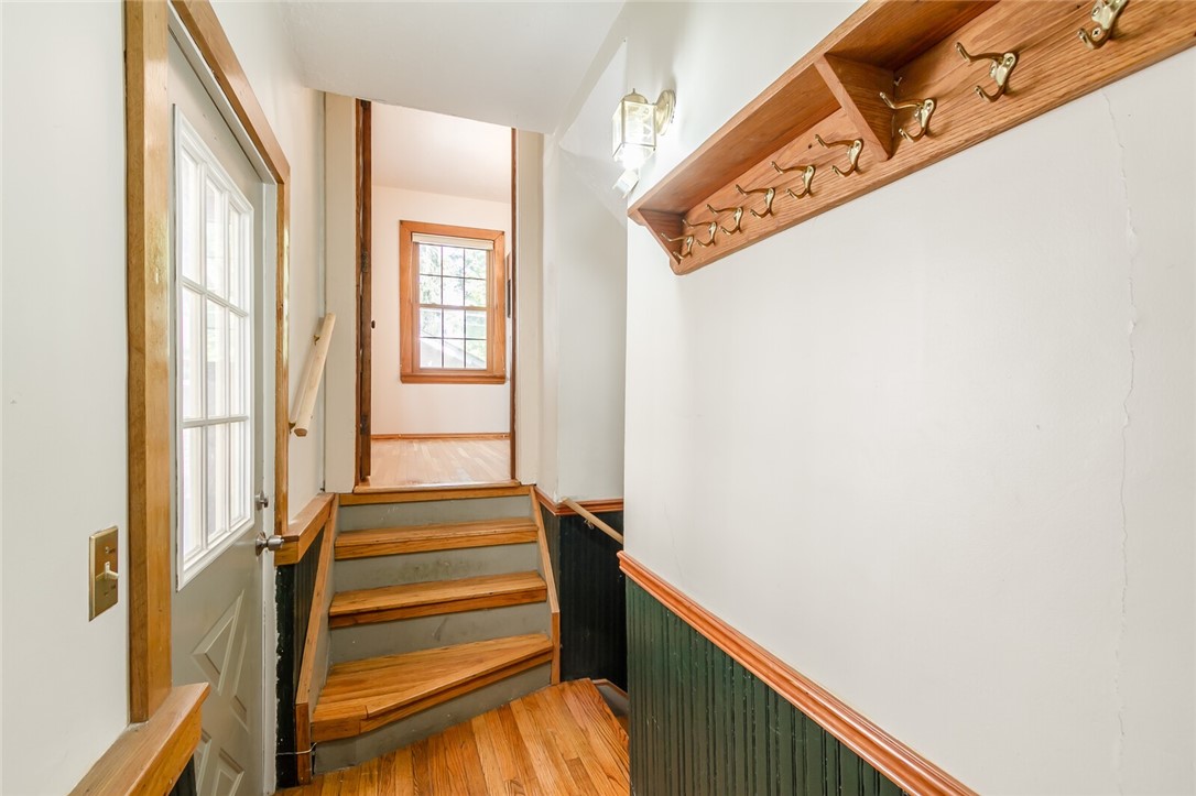 9 Menlo Place Rochester, NY 14620 - Photo 34 of 42 Stairway to lower level and access to the driveway