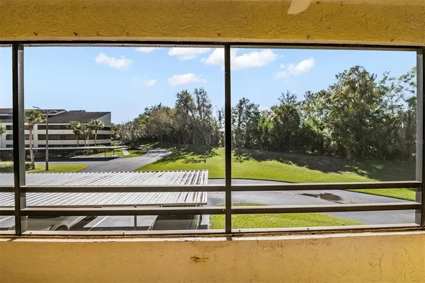 a view of swimming pool from a balcony