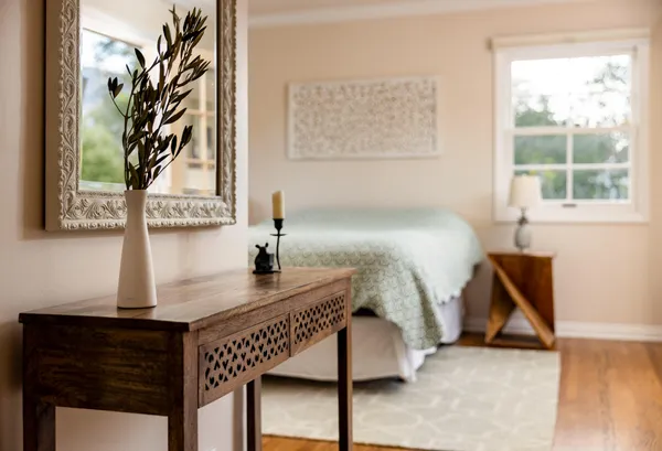 a bedroom with a bed and window