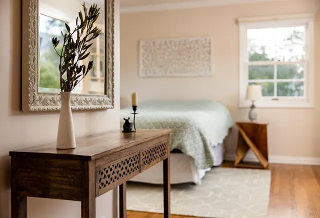 a bedroom with a bed and window