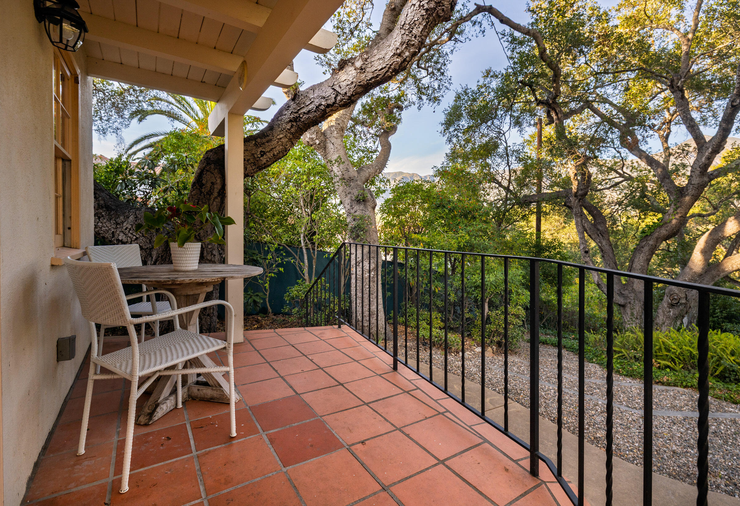 937 Arcady Road Montecito, CA 93108 - Photo 28 of 32 a view of a patio with table and chairs with wooden floor and fence