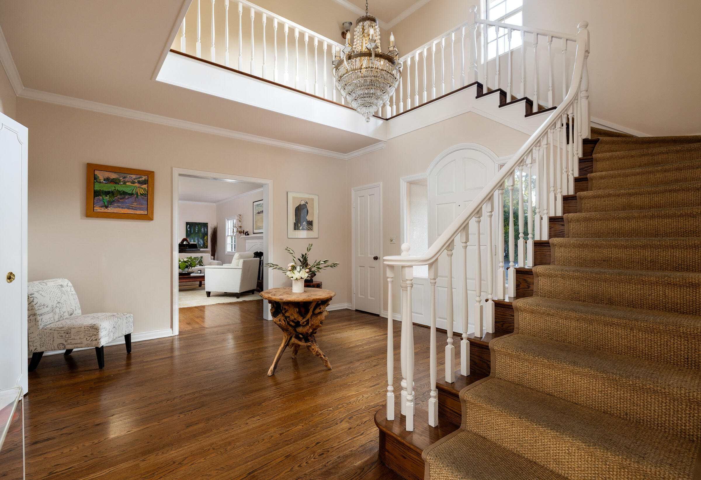937 Arcady Road Montecito, CA 93108 - Photo 7 of 32 a living room with wooden floor and stairs