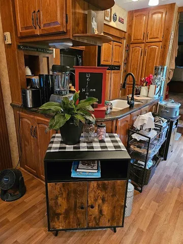 a utility room with toys and wall painting