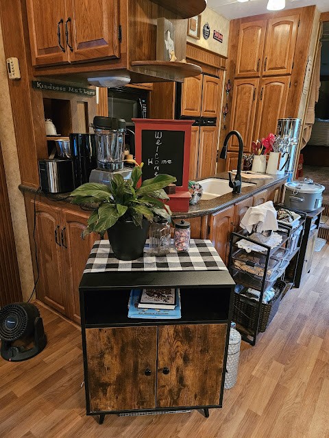 391 Deer Country Road Chester, TX 75936 - Photo 12 of 15 a table with chairs and wooden floor