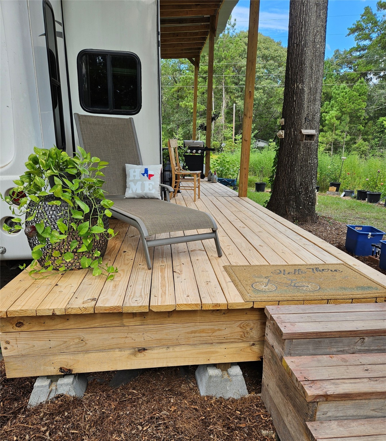 391 Deer Country Road Chester, TX 75936 - Photo 8 of 15 a wooden bench sitting in front of a building