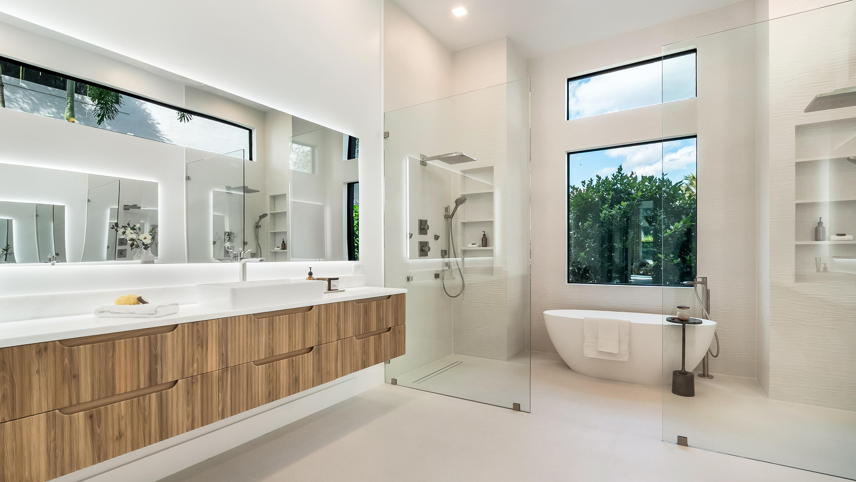 17400 Rosella Road Boca Raton, FL 33496 - Photo 30 of 102 a spacious bathroom with a tub shower and sink