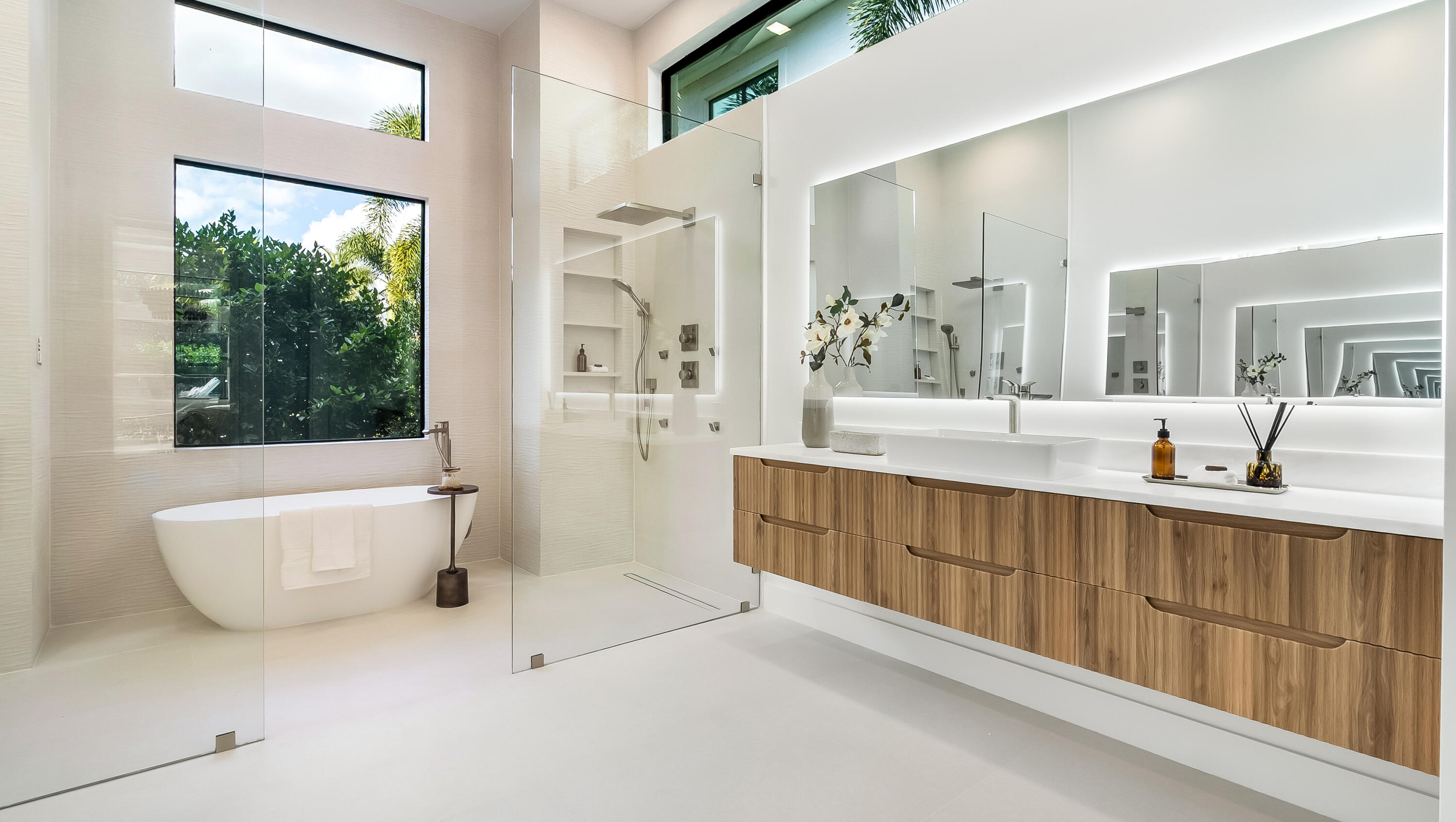 17400 Rosella Road Boca Raton, FL 33496 - Photo 31 of 102 a spacious bathroom with a tub sink and mirror