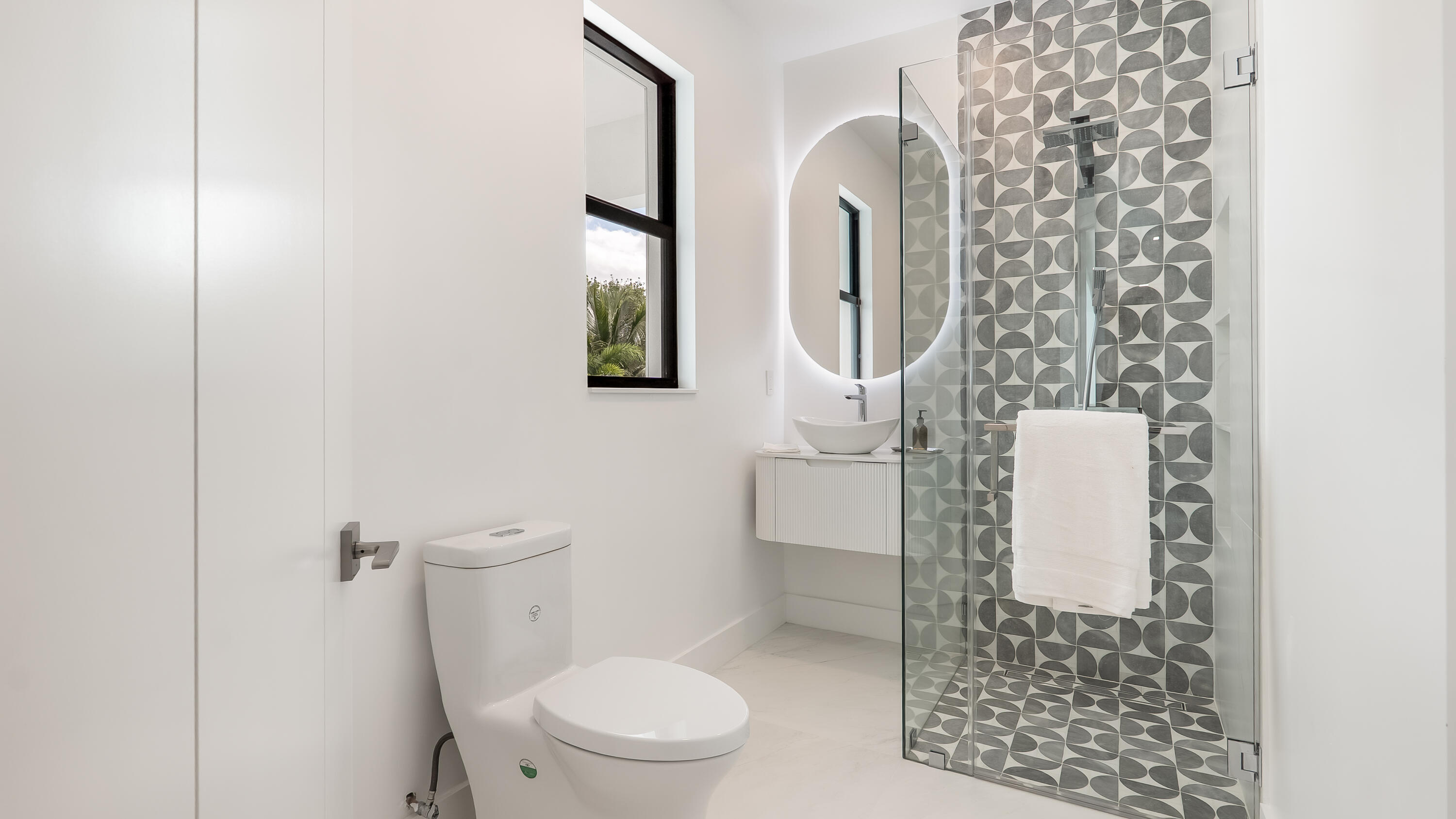 17400 Rosella Road Boca Raton, FL 33496 - Photo 60 of 102 a white toilet sitting next to a bathroom sink