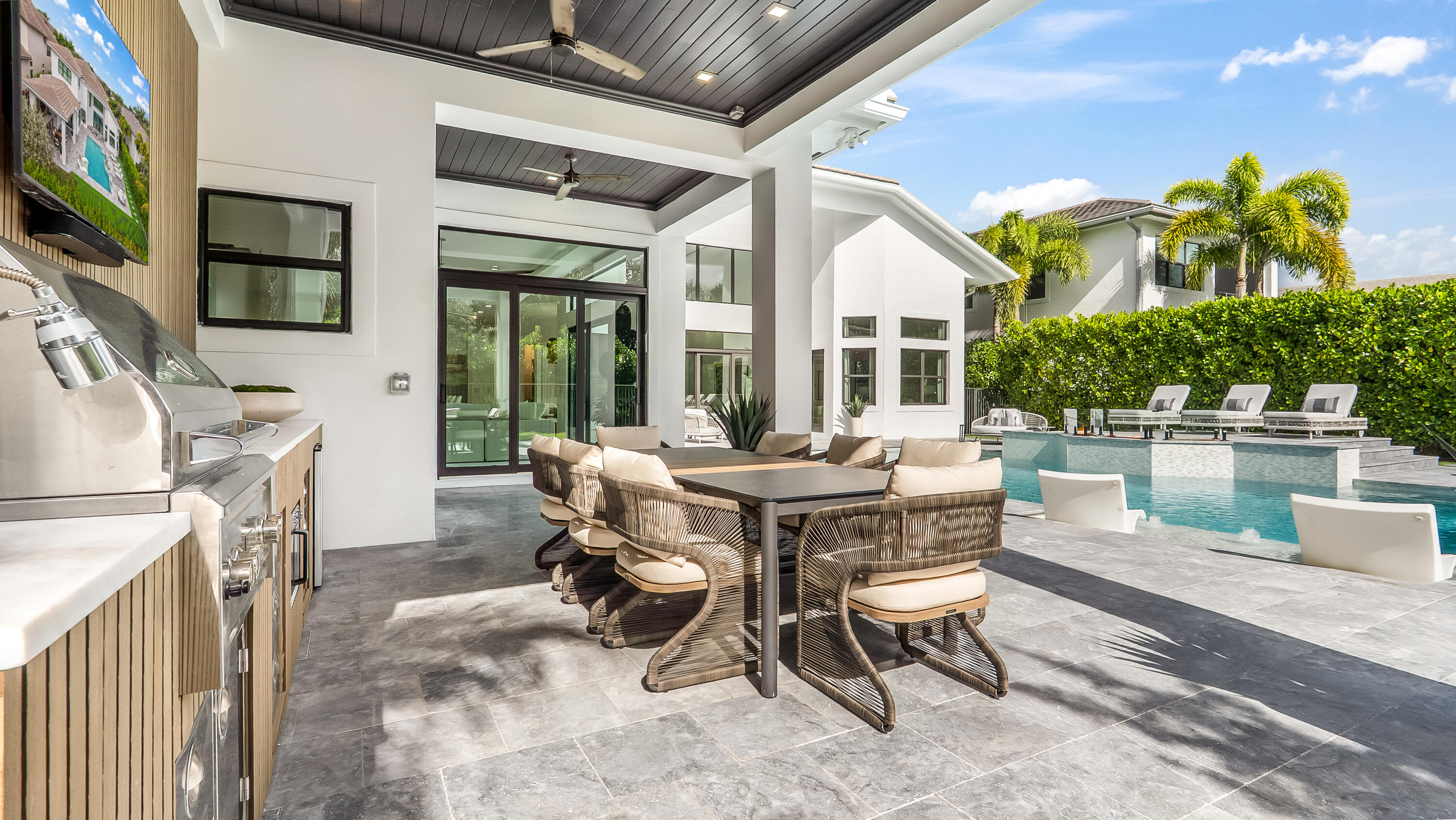 17400 Rosella Road Boca Raton, FL 33496 - Photo 82 of 102 a view of a patio with table and chairs potted plants with wooden floor