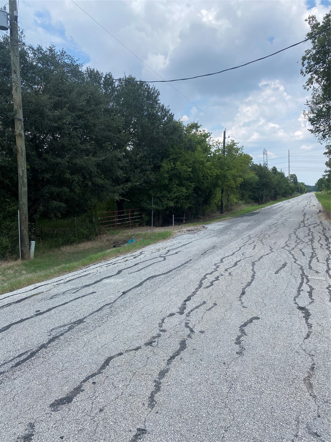 857-911 Insurance Road Richmond, TX 77469 - Photo 3 of 5 a view of a road with a yard