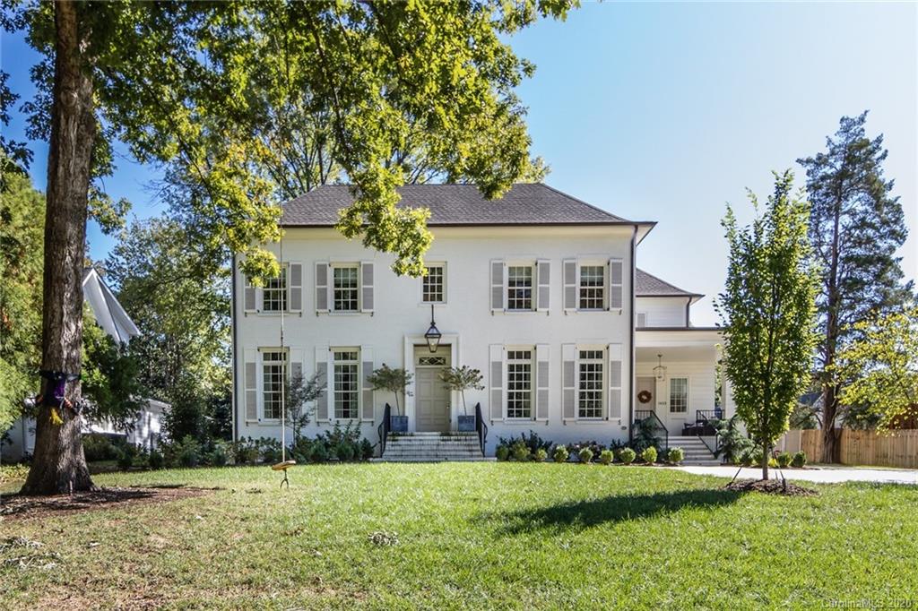 1423 Coventry Road Charlotte, NC 28211 - Photo 1 of 1 front view of a house with a yard