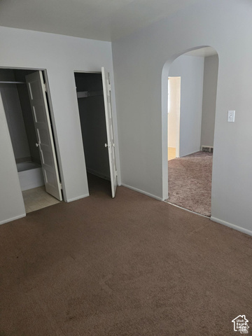 55 Bryner Street Helper, UT 84526 - Photo 6 of 8 Wall-to-wall carpeting and neutral wall paint