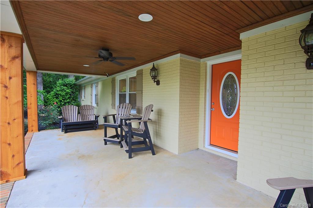 5708 Old Monroe Road Indian Trail, NC 28079 - Photo 2 of 26 a view of a patio with table and chairs and a barbeque