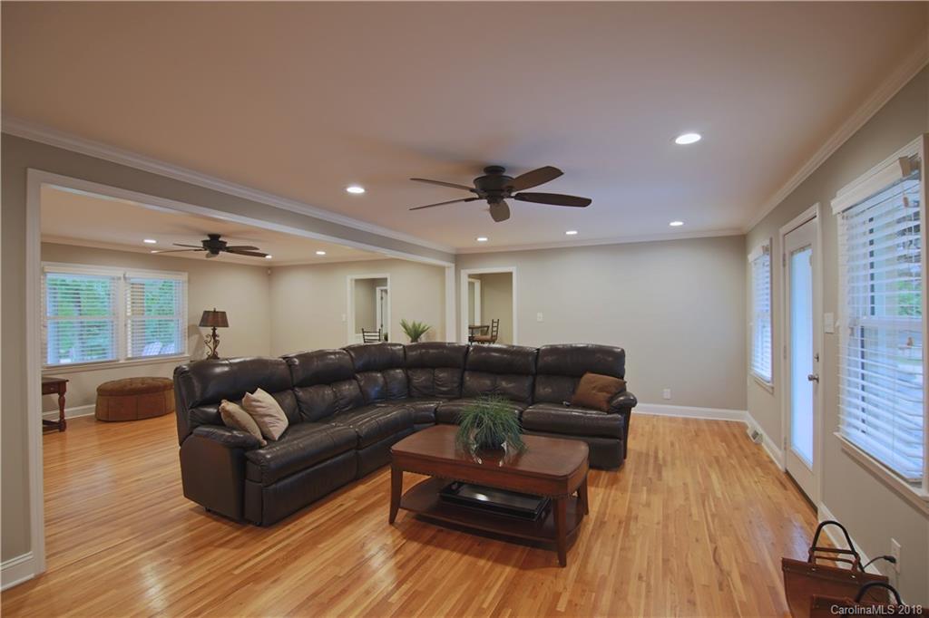5708 Old Monroe Road Indian Trail, NC 28079 - Photo 20 of 26 a living room with furniture and a wooden floor