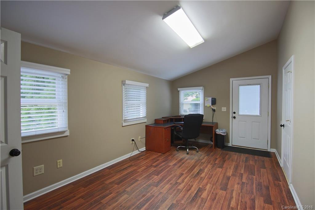 5708 Old Monroe Road Indian Trail, NC 28079 - Photo 8 of 26 a workspace with furniture and a window
