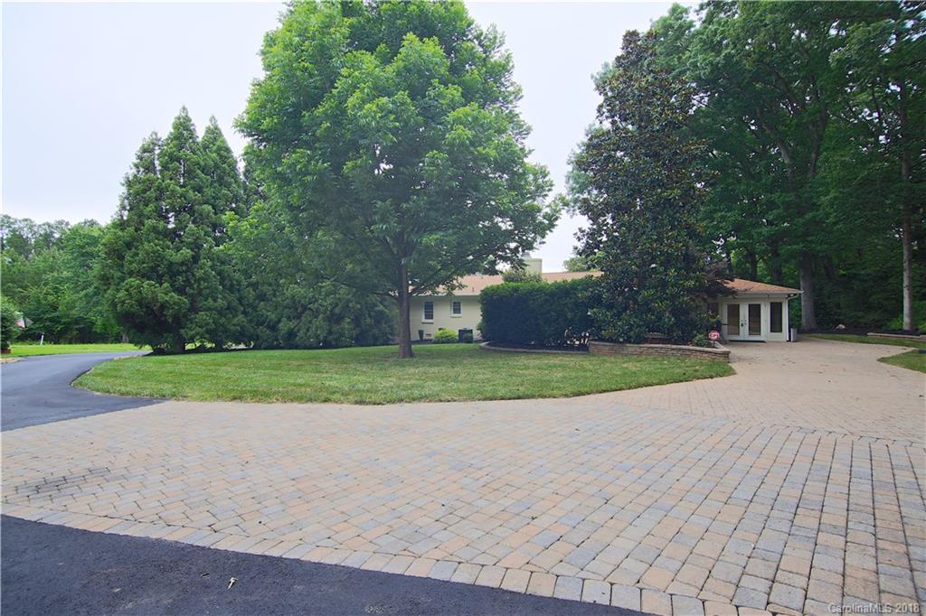 5708 Old Monroe Road Indian Trail, NC 28079 - Photo 9 of 26 a view of a house with a yard