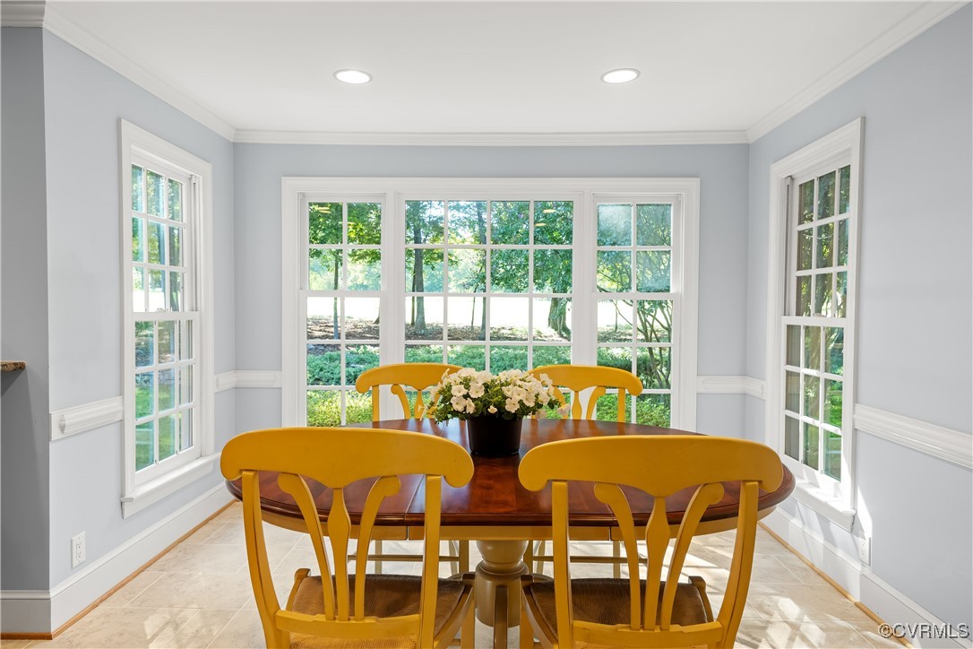 2410 Kentford Road Midlothian, VA 23113 - Photo 12 of 36 a view of a dining room with furniture and windows