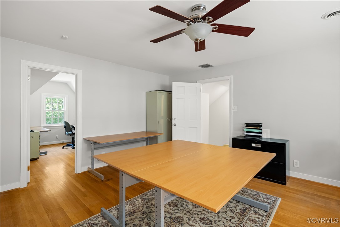 2410 Kentford Road Midlothian, VA 23113 - Photo 28 of 36 a bedroom with a bed and a chandelier