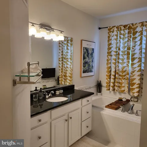 a kitchen with a sink stove and refrigerator