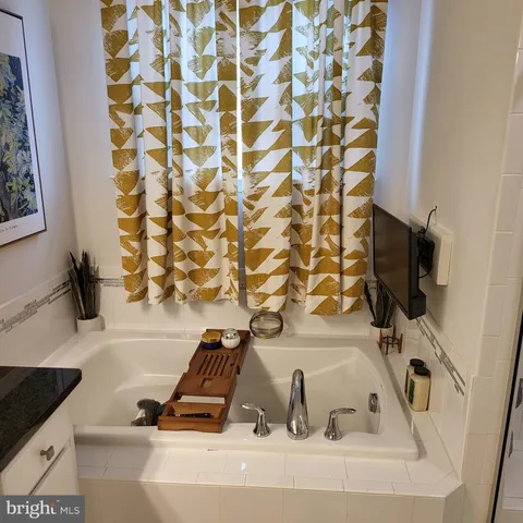 a bathroom with a sink and a tub
