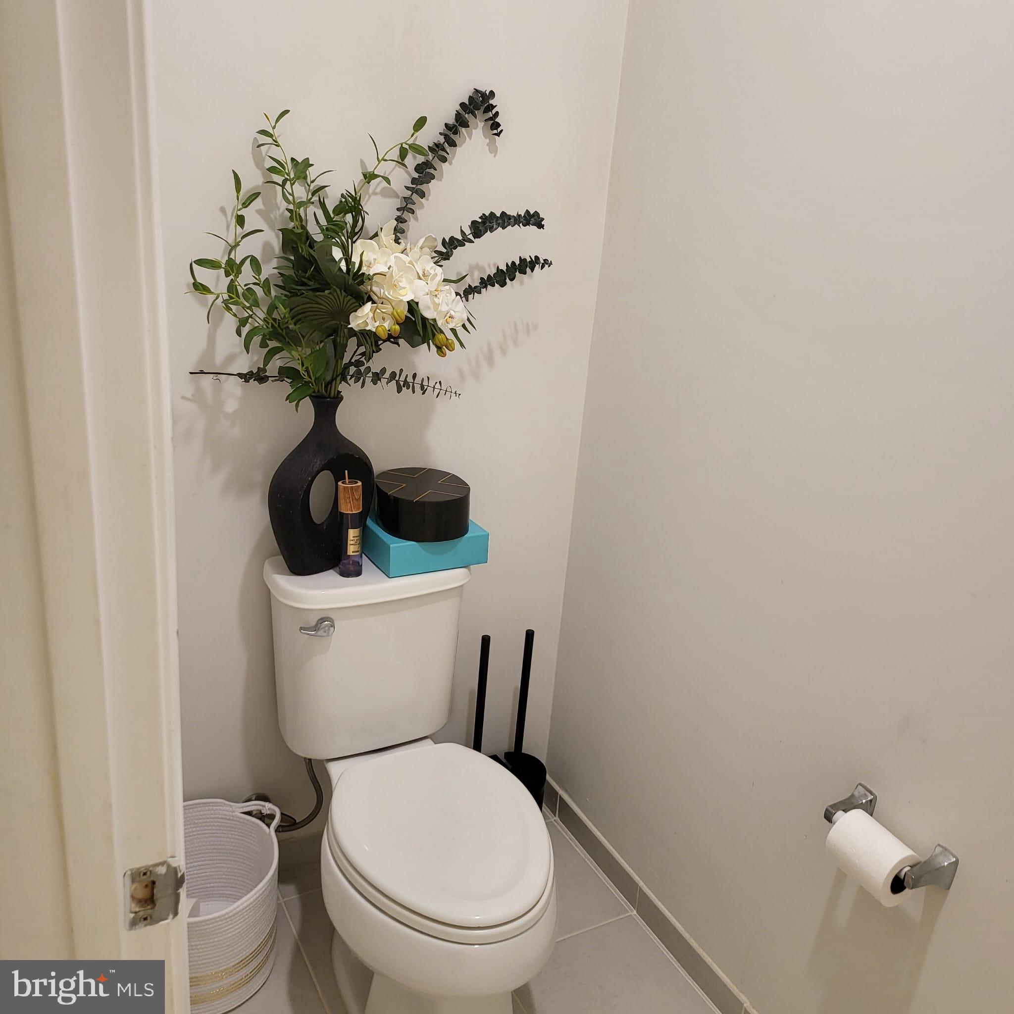 24626 Cable Mill Terrace Aldie, VA 20105 - Photo 16 of 46 a white toilet sitting next to a shower