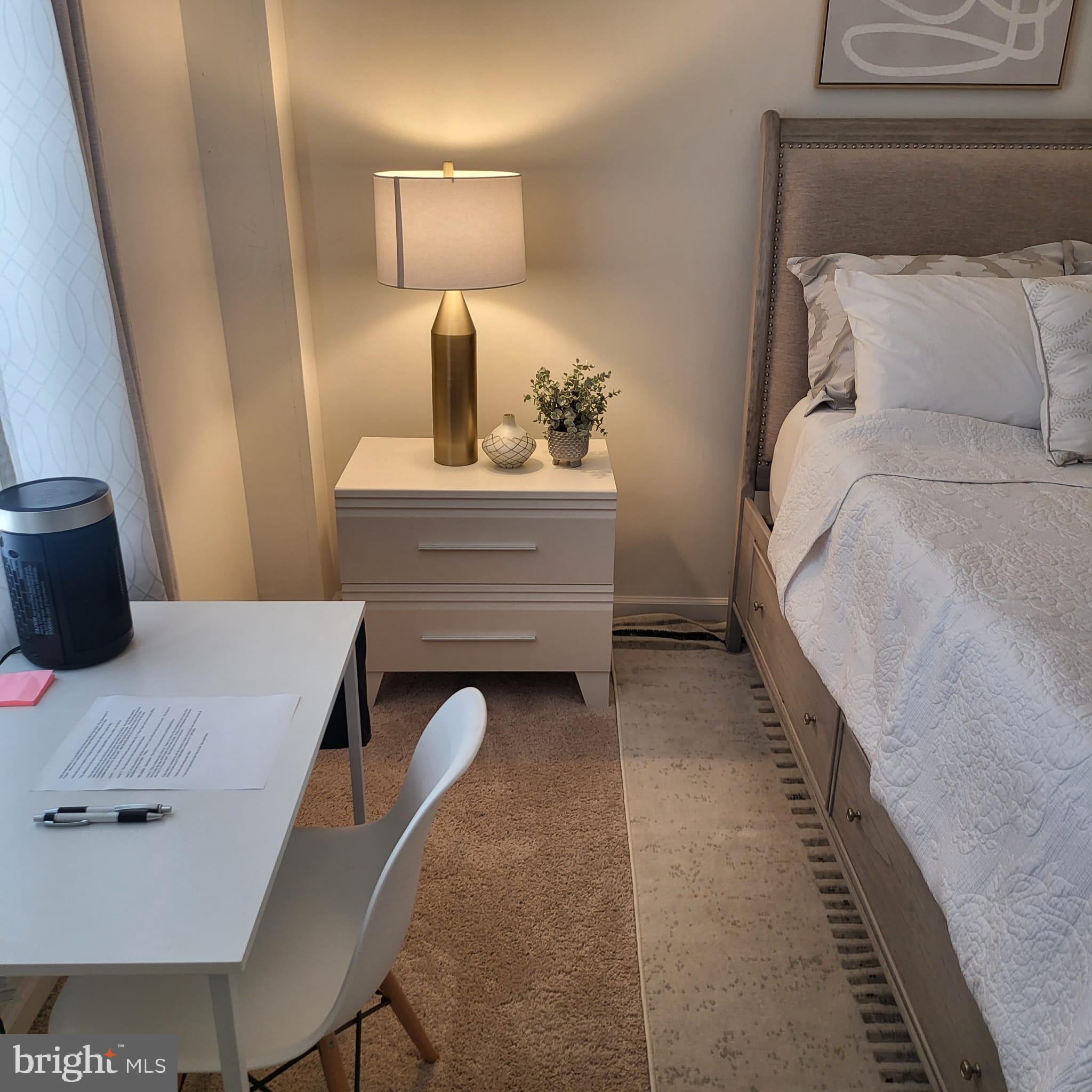 24626 Cable Mill Terrace Aldie, VA 20105 - Photo 22 of 46 a bedroom with a bed and lamp