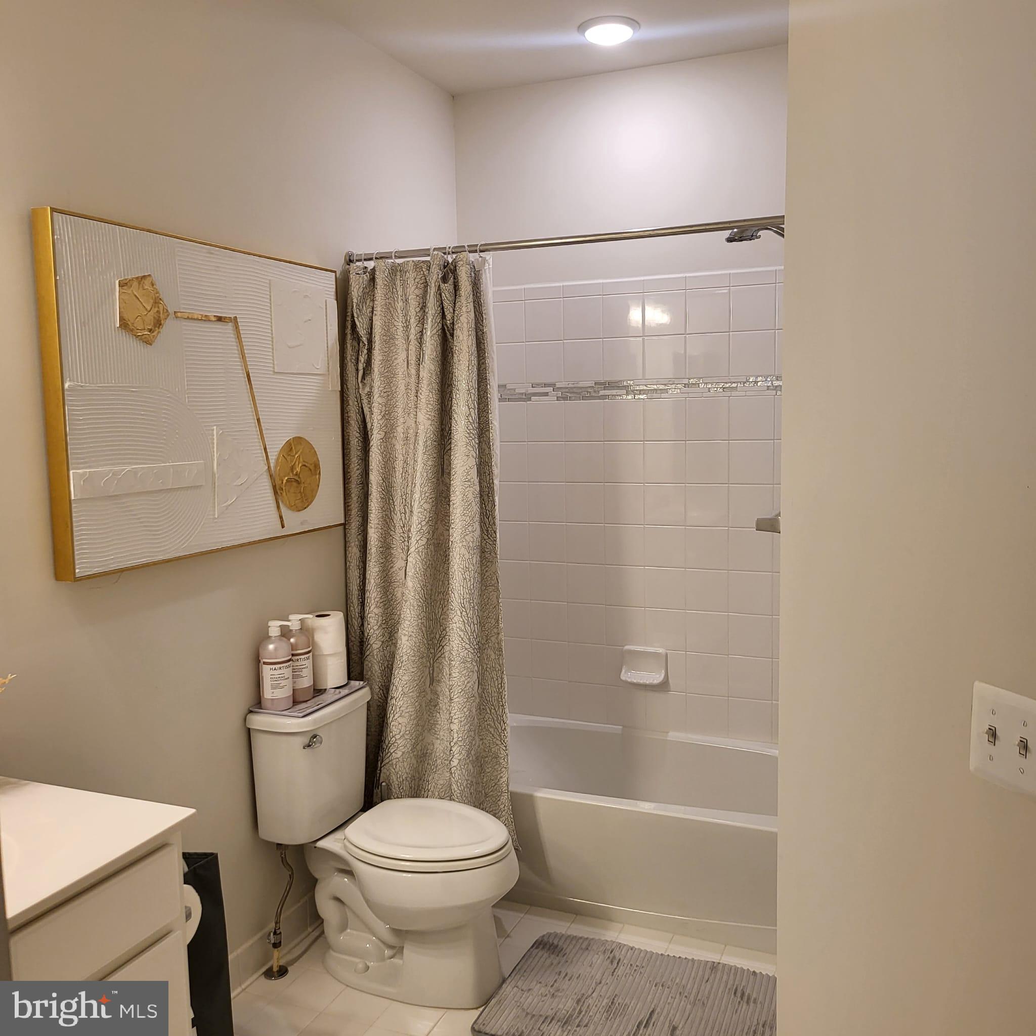 24626 Cable Mill Terrace Aldie, VA 20105 - Photo 23 of 46 a bathroom with a toilet and a shower