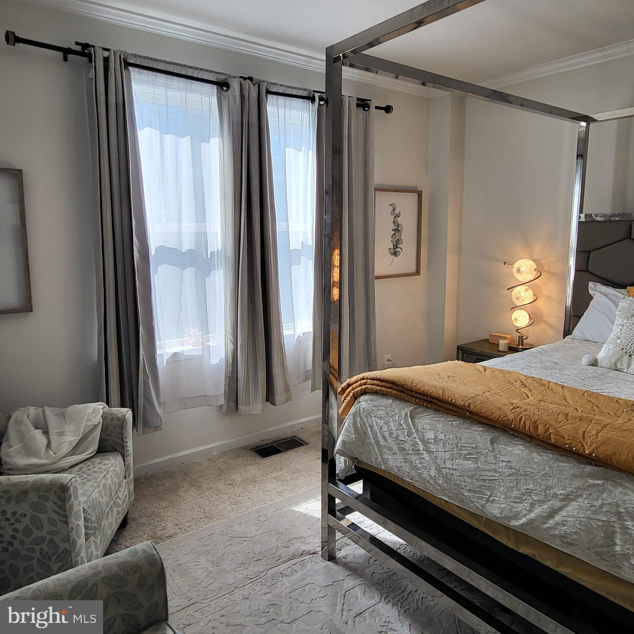 24626 Cable Mill Terrace Aldie, VA 20105 - Photo 32 of 46 a bedroom with a bed and a window