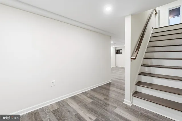 a view of entryway with wooden floor