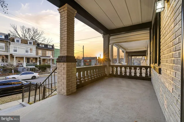 a view of a porch with furniture