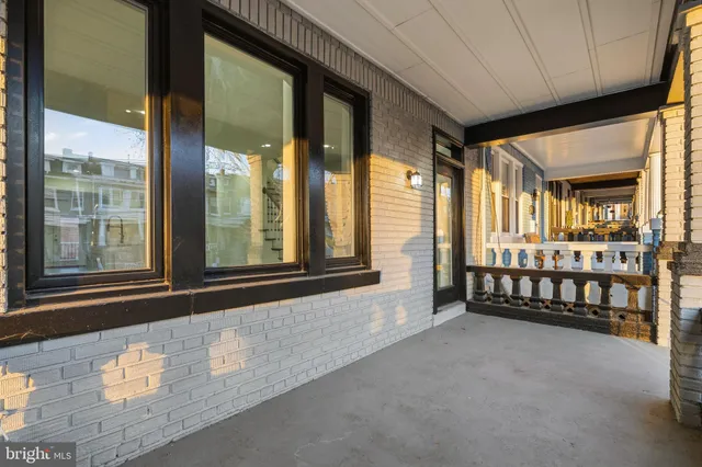a view of an front door with a couch