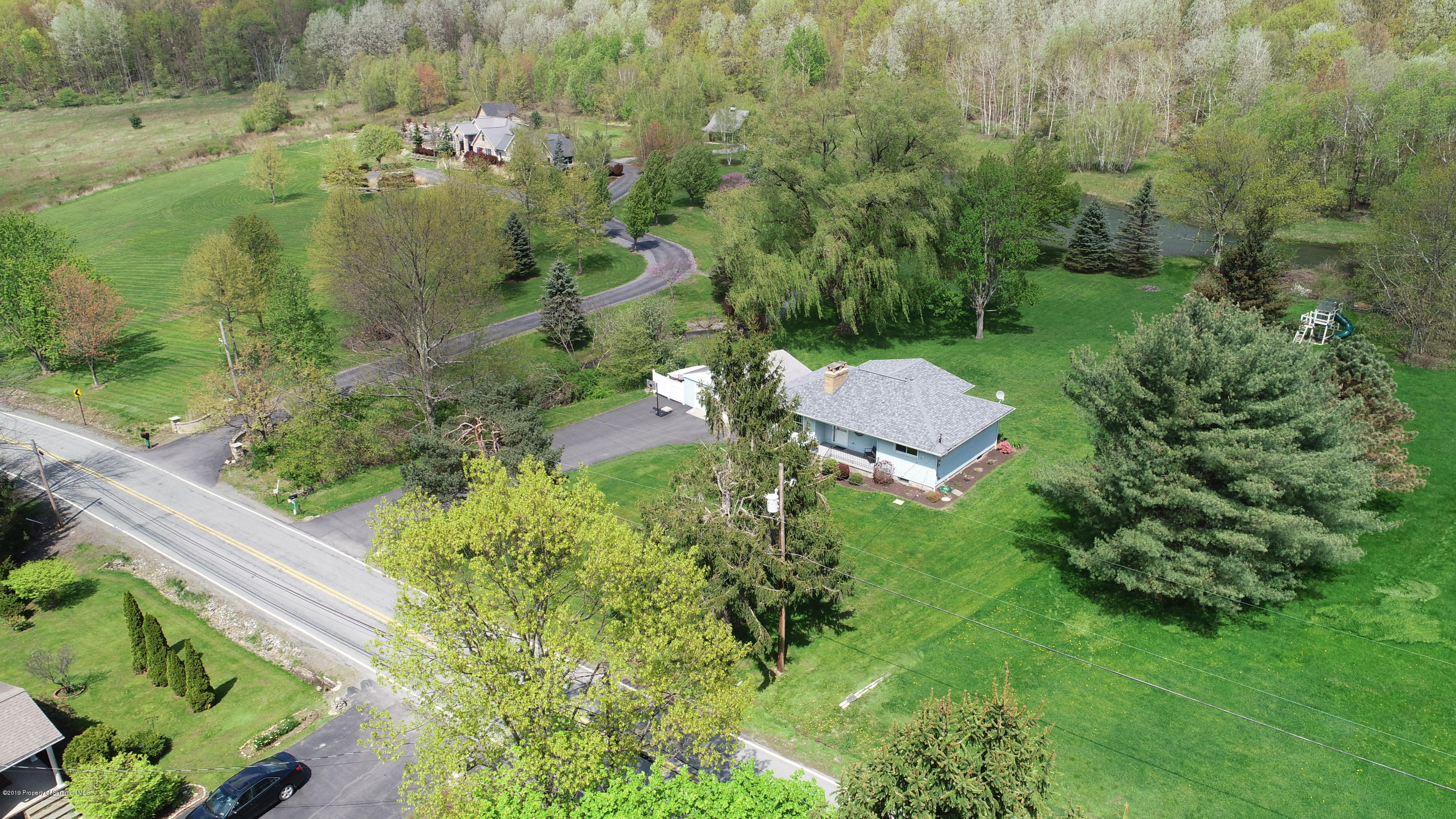 1020 Newton Road Clarks Summit, PA 18411 - Photo 5 of 40 Side