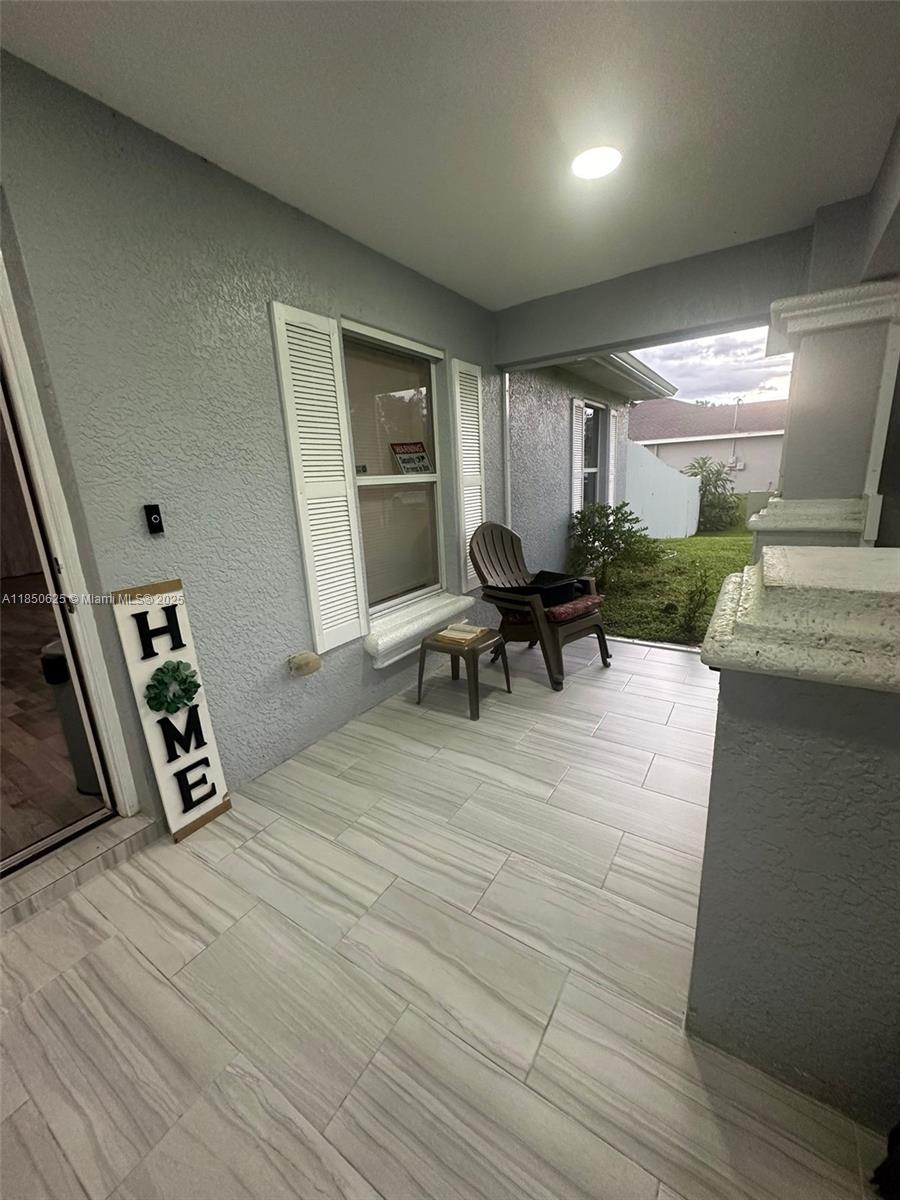 442 Conlee Street Lehigh Acres, FL 33974 - Photo 3 of 79 a living room with furniture