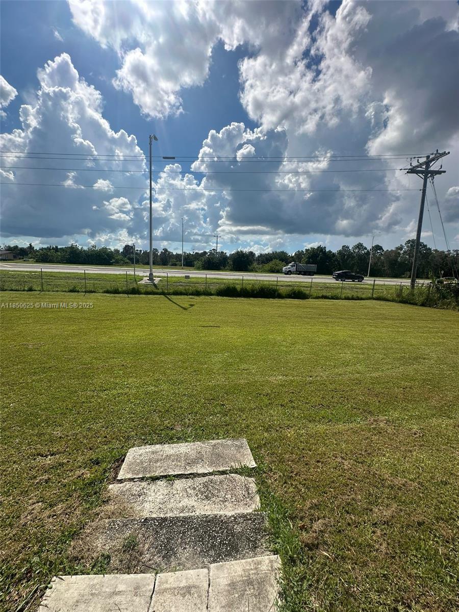 442 Conlee Street Lehigh Acres, FL 33974 - Photo 38 of 79 a view of an ocean with beach
